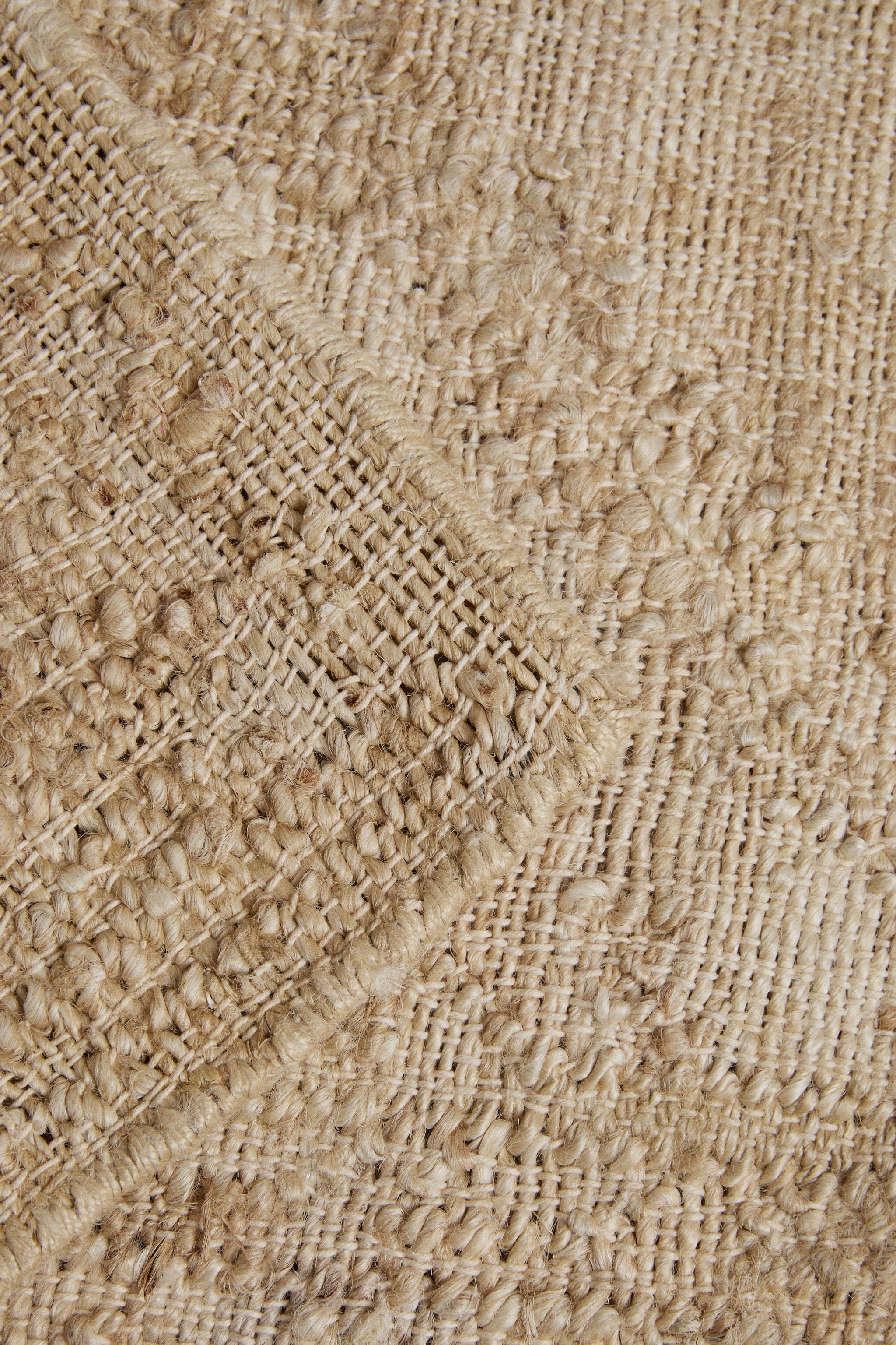 VINTAGE-EFFECT JUTE AREA RUG